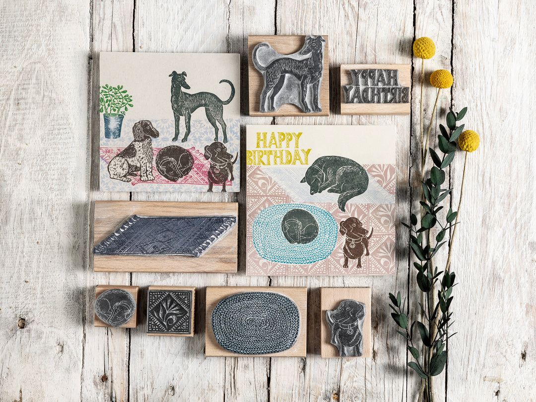 Sleepy Labrador Dog Stamps snoozing on rugs - Noolibird