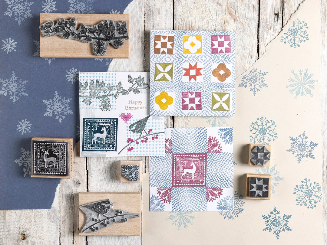 Small Christmas rubber stamps by Noolibird — snowy landscape, polar bear, deer and decorative border lino cuts