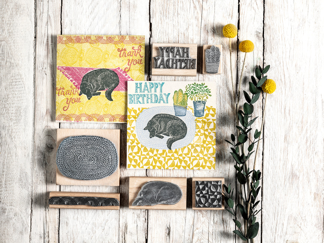 Sleepy Labrador Dog Stamps snoozing on rugs - Noolibird